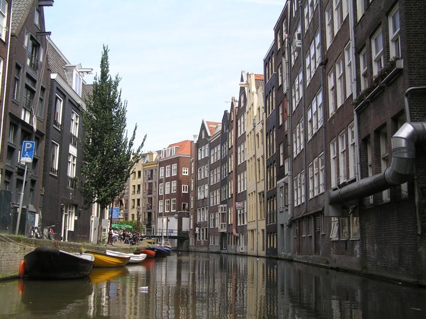 Amsterdam Old City Private Walking Tour - Passing the Red Light District with context, not chaos