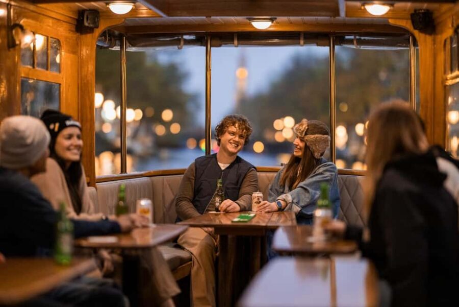 Amsterdam: Open Boat Cruise option Unlimited Drinks & Bite - Open-boat comfort: sun, chill, and winter switchovers