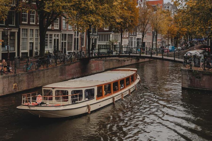 Amsterdam: Open Boat Cruise option Unlimited Drinks & Bite - Live guide and skipper: how the commentary changes your day