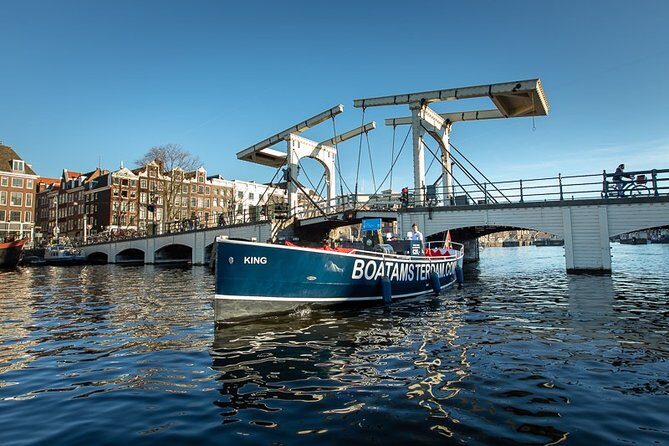 Amsterdam Open Boat Cruise with Live Guide and Two Drinks - Heated Seats, Umbrellas, and What Weather Changes on the Cruise