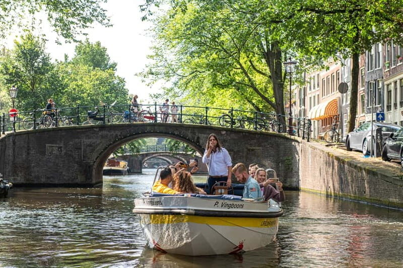 Amsterdam: Open Boat Tour of Canals with Expert Local Guide - Why an open boat canal cruise beats the big-tour feeling