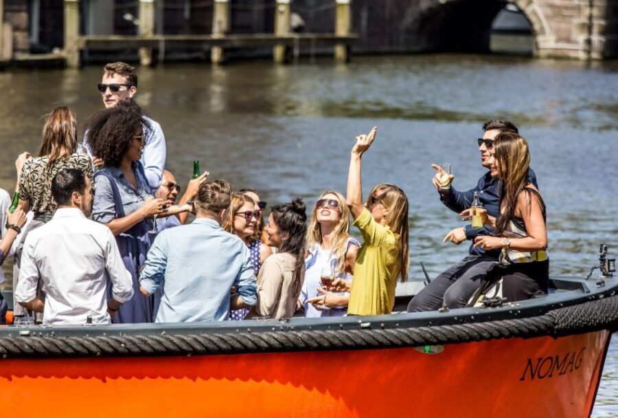 Amsterdam: Private BBQ Cruise with Personal Chef & Drinks - Meeting Point and Finding Your Crew in Orange