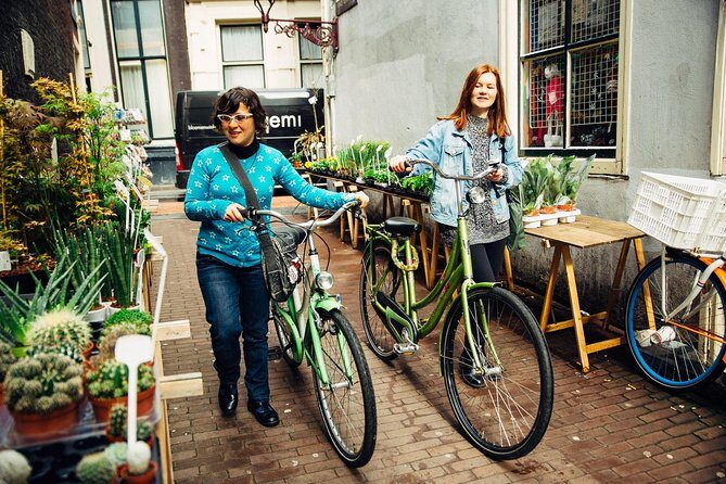 Amsterdam PRIVATE Bike Tour With Locals: Bike & Local Snack Included - The core ride through canals, greens, markets, and Jordaan