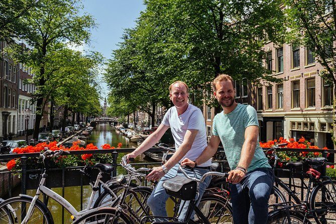 Amsterdam PRIVATE Bike Tour With Locals: Bike & Local Snack Included - Personalization is the real selling point