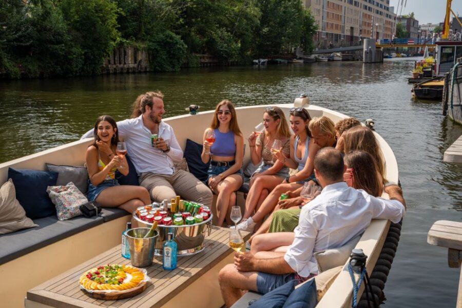 Amsterdam: Private Canal Booze Cruise with Unlimited Drinks - Covered Comfort and Easy Photo Angles