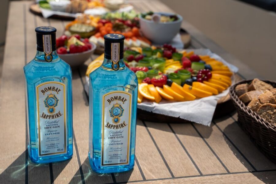 Amsterdam: Private Canal Booze Cruise with Unlimited Drinks - The Guides: Skipper + Local Host That Keep the Mood Right