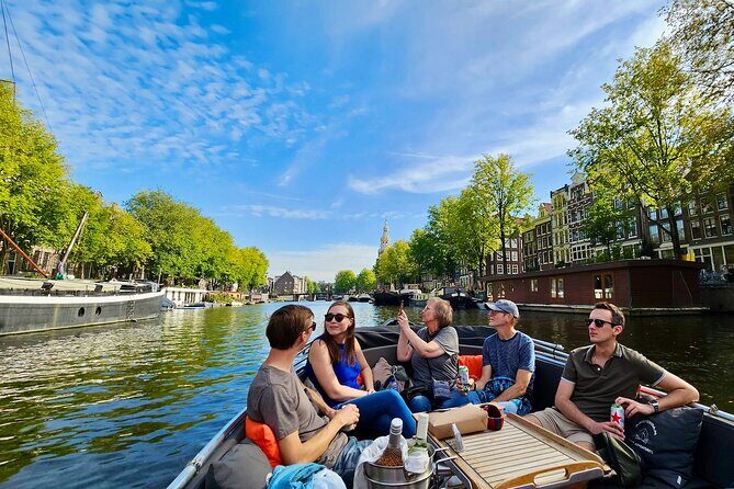 Amsterdam Private Canal Cruise – 90 Minutes through the Old City - Oude Kerk and the Kolksluis lock: why these spots matter