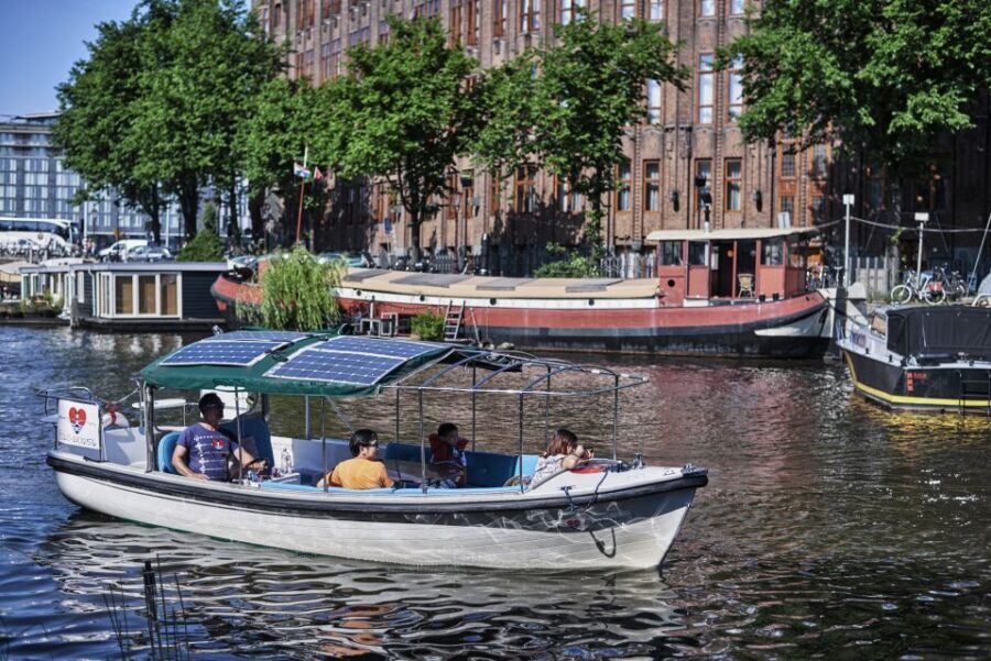 Amsterdam: Private Canal Tour - Seven Bridges and Dancing Houses: photo-friendly angles, not just sightseeing