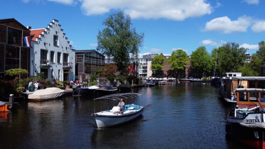 Amsterdam: Private Canal Tour - Where you meet: the light-blue roof tip that saves time
