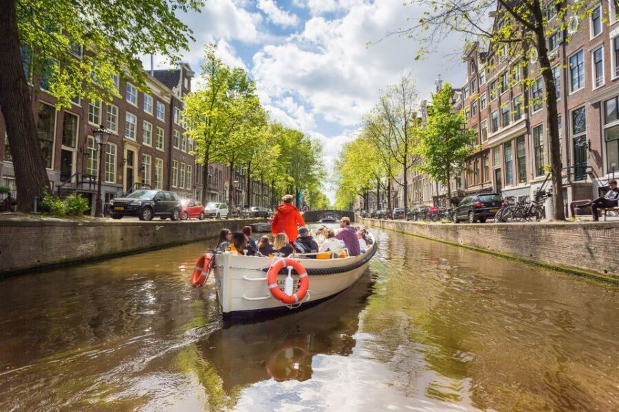 Amsterdam: Private Cruise with Drinks & Optional Snacks - The open boat + the no-music rule
