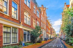 Amsterdam Private Historical Walking Tour - Dam Square: Amsterdam’s power center and timeline marker