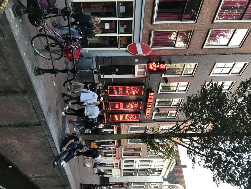 Amsterdam: Private Red Light District and Food Tour - Chinatown and the Narrowest House in Europe: Amsterdam’s Side-Quests