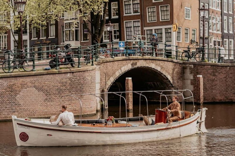 Amsterdam: Private Romantic Canal Cruise w. Prosecco/Snacks - What “romantic stories + music” actually feels like on the water