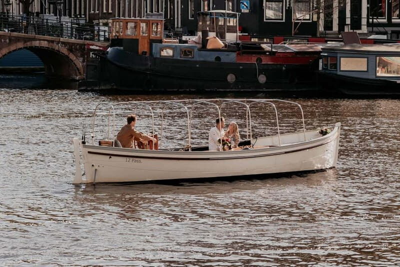 Amsterdam: Private Romantic Canal Cruise w. Prosecco/Snacks - Value: how $268 per group works for a couple
