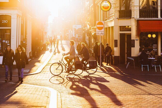 Amsterdam Private Tour: Highlights & Hidden Gems by Bike or Foot - Beursplein to Dam Square: getting your bearings without the museum marathon