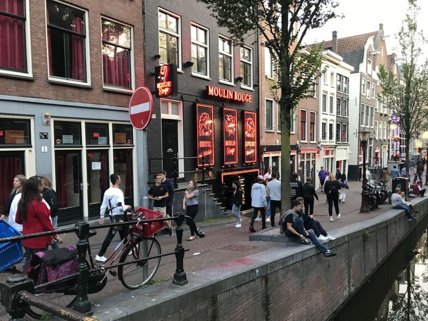 Amsterdam: Red Light District and Local Pub Tour - The first stretch: Oude Kerk, Warmoesstraat, and Zeedijk’s older layers