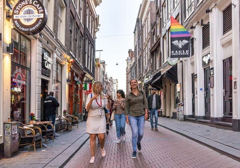 Amsterdam: Red Light District Tour in German/English/Italian - Dancing Houses: postcard angles with a practical backstory