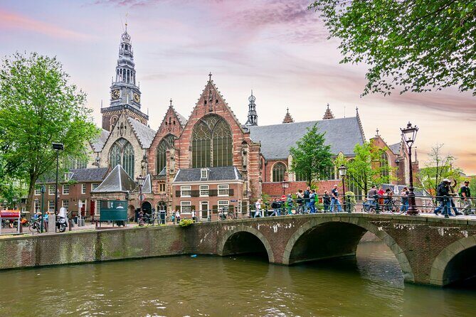 Amsterdam Red Light District Treasure: Self-Guided Tour & Quest - Montelbaanstoren and the Walls of Amsterdam: defensive engineering you can spot