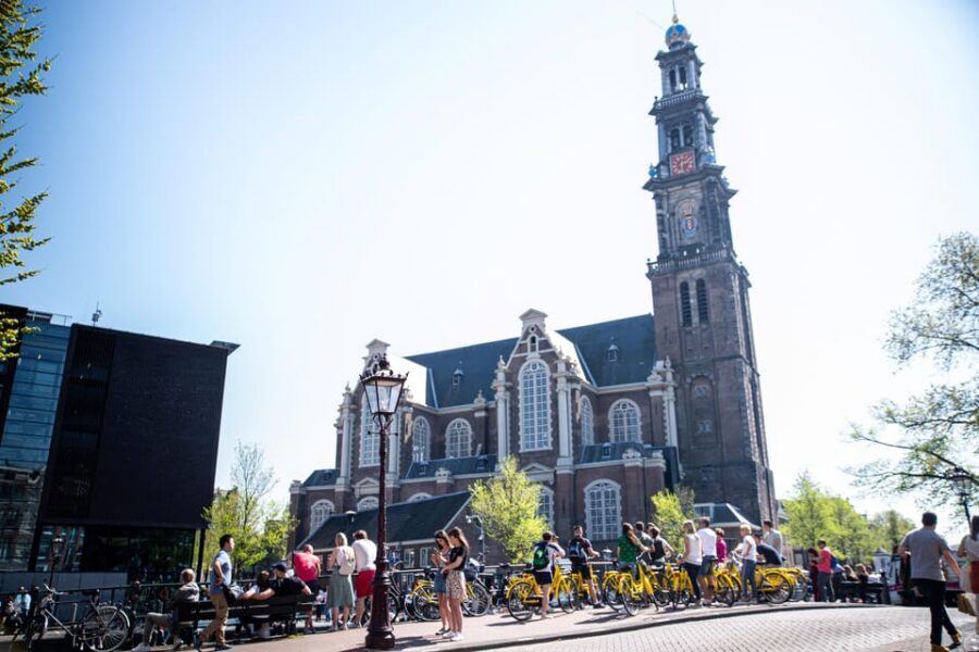 Amsterdam: Relaxed City Highlights Guided Bike Tour - From P.C. Hooftstraat to Skinny Love Bridge: luxury streets meet classic romance