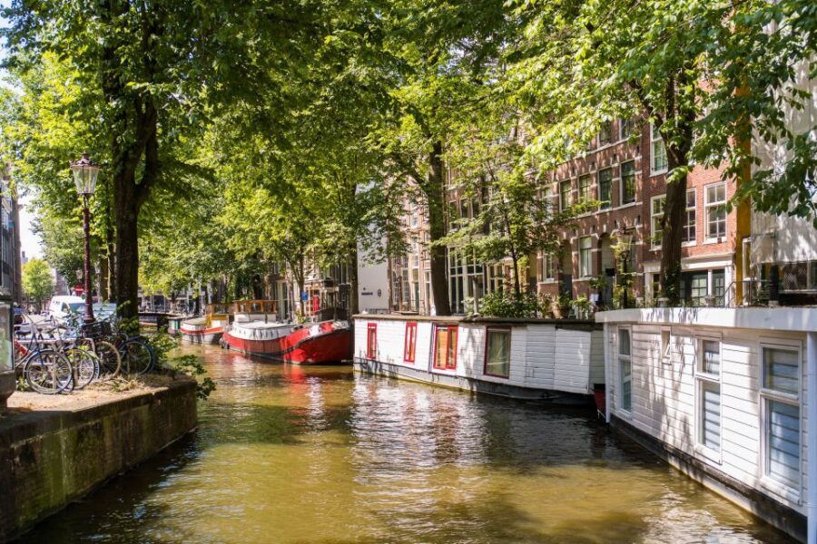 Amsterdam: Semi-Open Canal Boat Cruise - Choosing the right time slot: weather, crowd level, and comfort