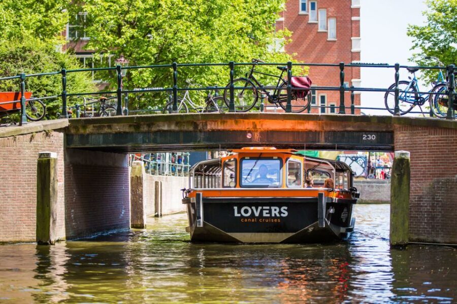Amsterdam: Semi-Open Canal Boat Cruise - Audio guide in 19 languages: the smartest way to use it