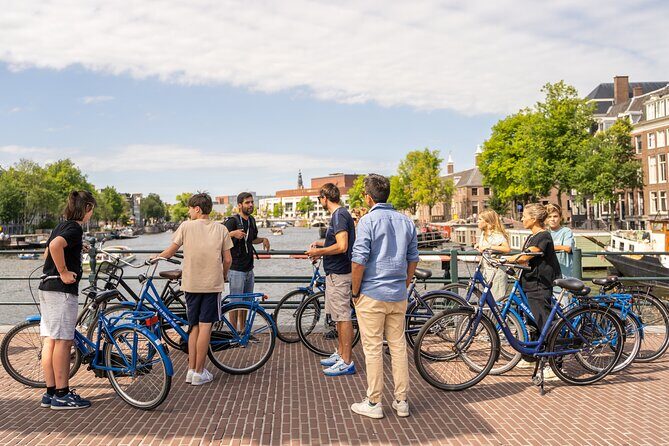 Amsterdam Small-Group Bike Tour With Optional Canal Cruise - The Narrowest Bridge Stop and the Museum Quarter Rhythm