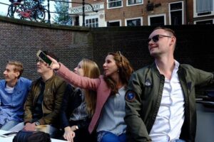 Amsterdam Small-Group Canal Cruise Including Snacks and Drinks - The Electric Open Sloop: Panoramic Views Without the Fight for a Spot