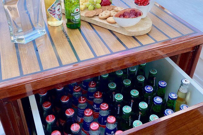 Amsterdam Small-Group Canal Cruise Including Snacks and Drinks - Hortus Botanicus Views: A Quiet Detour by Water