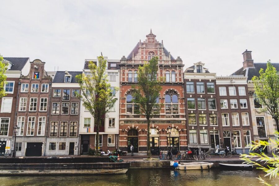 Amsterdam Small-Group Walking Tour - Beursplein to Dam Square: trading power meets civic space