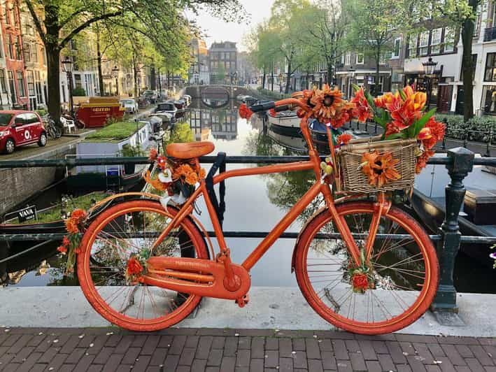 Amsterdam: Small Group Walking Tour with Fun Guide - Canals, Canal Houses, and the Canal-Ring Reality Check