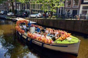 Amsterdam: The Original Flower Boat with Local Guide and Bar - Price, timing, and where to meet the blue-crew team