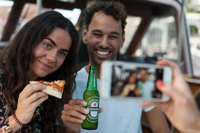 Amsterdam The Original Pizza Cruise with Unlimited Drinks - 90 minutes on Amsterdam canals, timed for evening magic