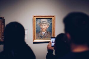 Amsterdam Van Gogh Museum Guided Tour with Tickets Included - Meeting your guide by the Museumshop with the white umbrella