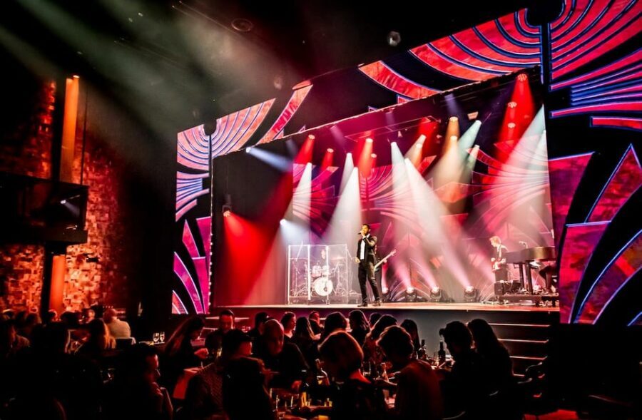 Amsterdam: VEGAS Dinner Show with 3-Course Sharing Menu - Inside the Show: Live Music, Circus Acts, Illusions, and Nigel Otermans
