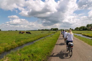 Amsterdam: Windmill, Cheese, and Countryside E-Bike Tour - A’DAM Tower area views and the first ride rhythm