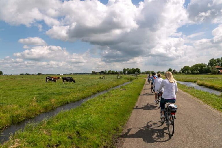 Amsterdam: Windmill, Cheese, and Countryside E-Bike Tour - A’DAM Tower area views and the first ride rhythm