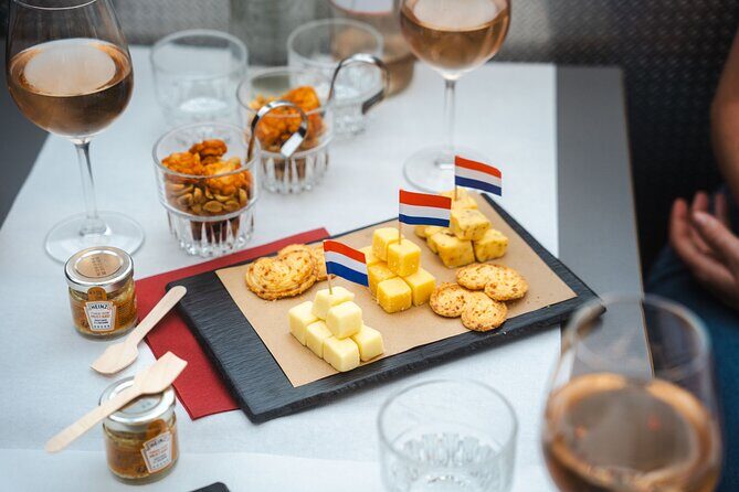 Amsterdam: Wine and Cheese Evening Cruise - A 90-Minute Amsterdam Night Show on the Canal Belt