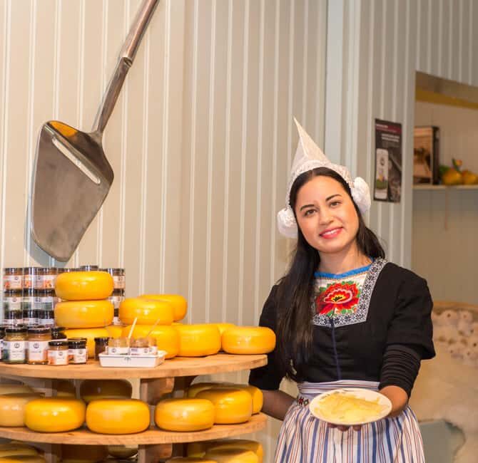 Amsterdam: Zaanse Schans windmills & Volendam Guided Tour - The hands-on stops: clogs and cheese that actually teach you something