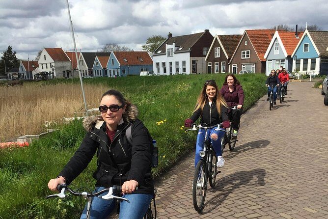 Amsterdam's Countryside Half-Day Bike Tour in Small Group - Stop-by-stop: Holysloot, Ransdorp, and the 1792 windmill