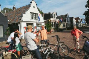 Cheese, Canals & Windmill Countryside E-Bike Tour Amsterdam - Amsterdam Centraal and the Ferry to Amsterdam North: The Quick Exit