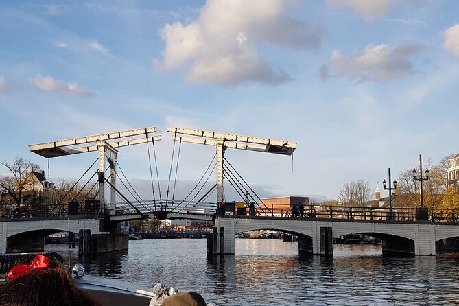 Classic Salonboat Tour in Amsterdam Including Cheese and Wine - Why this classic salonboat route makes Amsterdam click