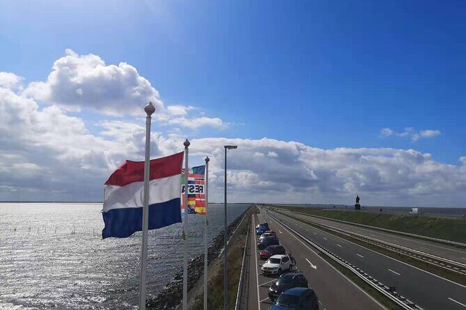 Day Tour Giethoorn, Afsluitdijk and Zaanse Schans with Boat Cruise - Zaanse Schans Cheese Farm Stop: Tasting Your Way Through Traditional Dutch Cheesemaking