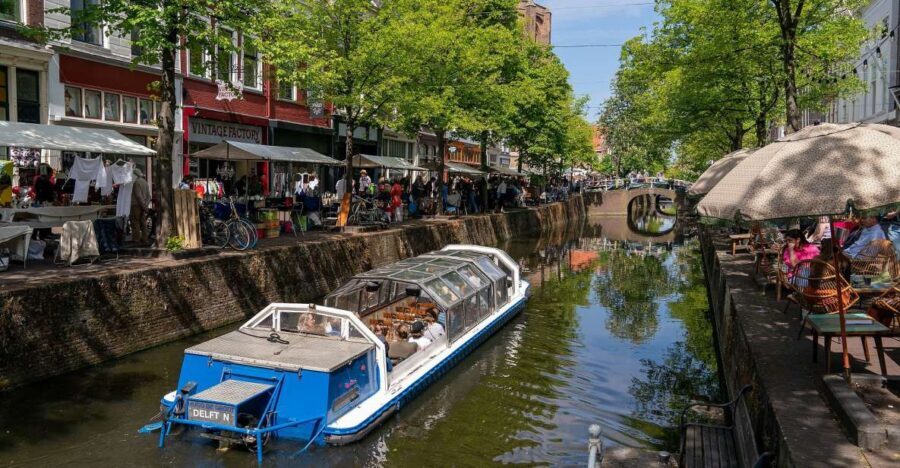 Delft: Canal Cruise with Guided Commentary - Who’s Doing the Talking: Live Guide + Captain, With Real Personality