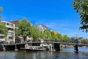 Discover Amsterdam: Luxury Canal Cruise with a Local Skipper - Finding the meeting point: the free ferry hop and a short walk