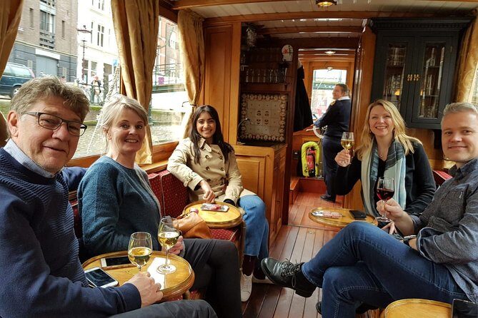 Eating Amsterdam: Food Tour & Canals Cruise - Stop 3: Café De Poort and Organic Gouda in a Cozy Brown Café
