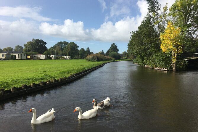 Giethoorn and Zaanse Schans Day Tour Small Group Incl. Boat Ride - Giethoorn on the clock: boat cruising and free time in a car-free canal town