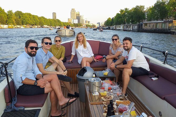 Guided Amsterdam Canal Cruise – Snacks & Drinks on board(1 Hour) - One-Hour Cruise Power: UNESCO Canals Without the Time Sink