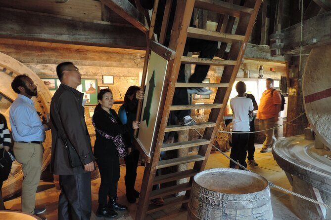 Guided Day Trip - Volendam, Zaanse Schans, Marken & Edam - Marken: wooden shoes, steam-powered craft energy, and fishing-village vibes