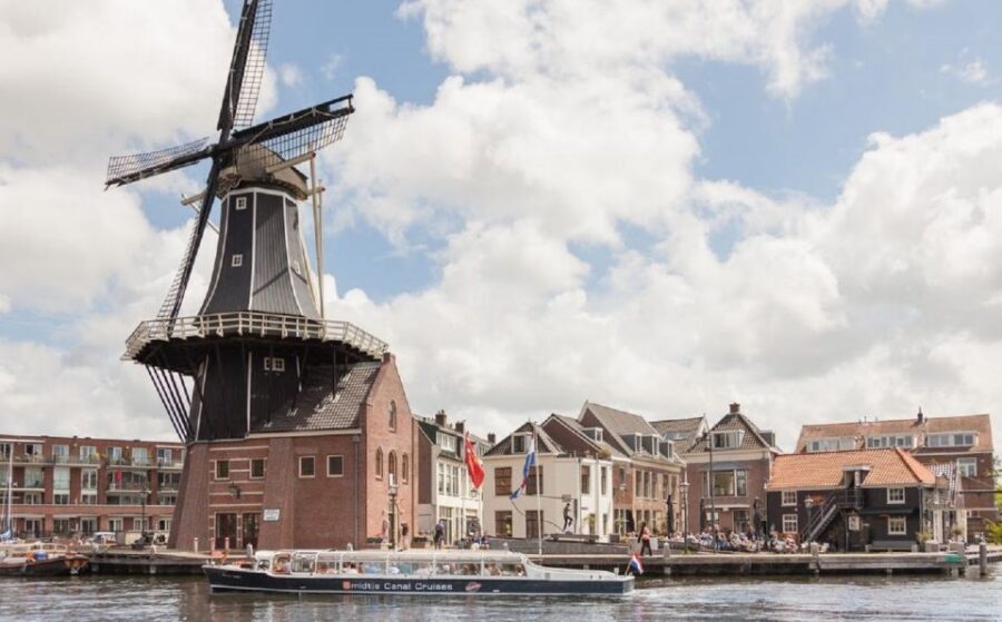 Haarlem: Dutch Windmill & Spaarne River Sightseeing Cruise - Weighing House and Teylers Museum views: landmark continuity