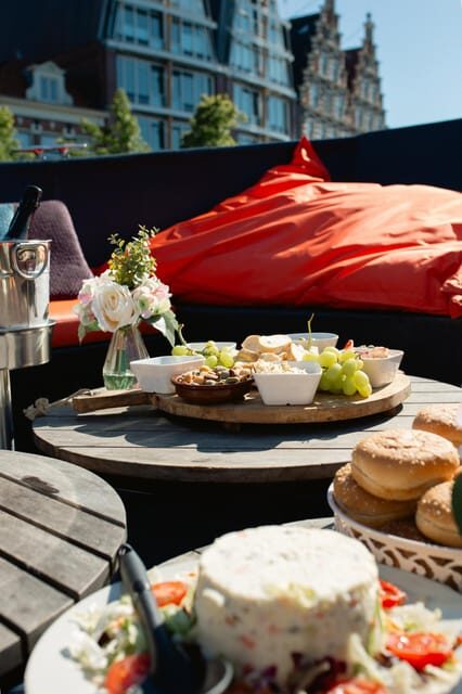 Haarlem: Sightseeing Boat Tour with Snacks and Drinks - Nieuwe Gracht 80 Start Point and What Boarding Is Like